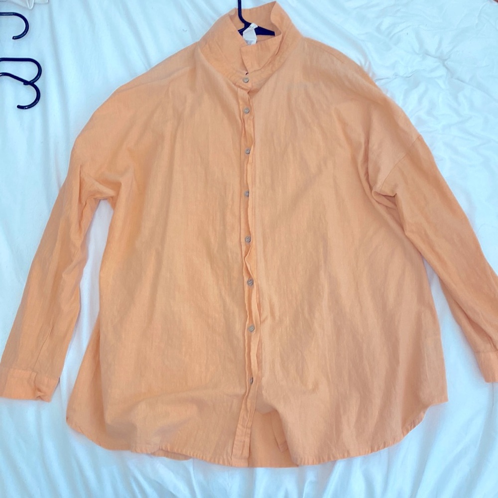 Peach colored button up shirt!
